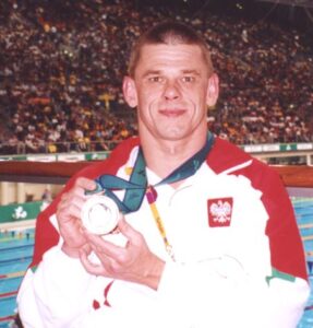 Zdjęcie Krzysztofa Ślęczki - wybitnego polskiego pływaka i paraolimpijczyka.